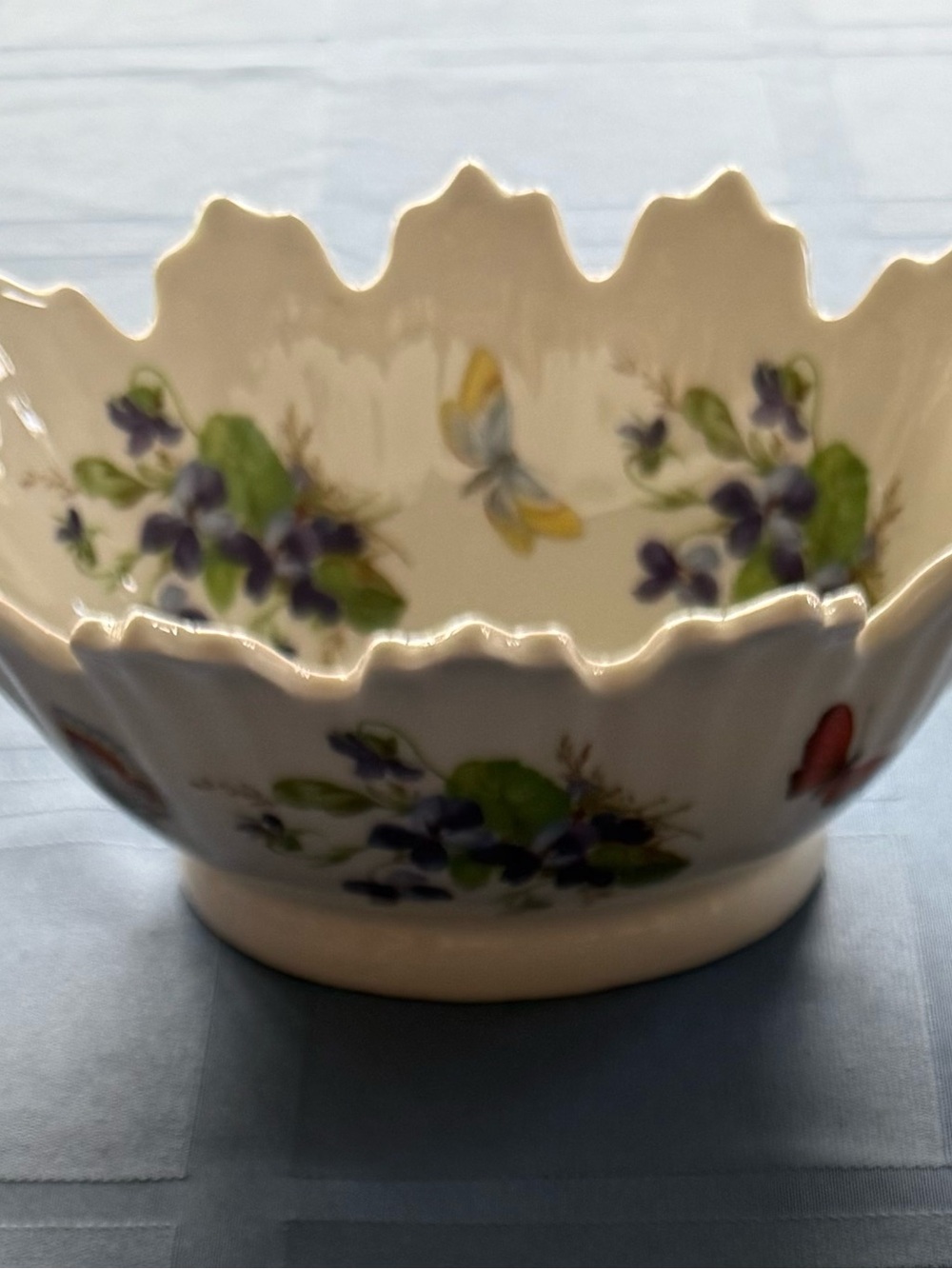 Decorative White Porcelain Bowl with Violet Floral and Butterfly Motif